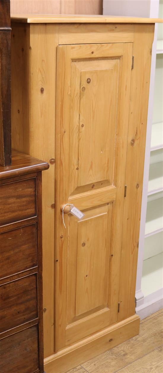 A slender pine cupboard W.66cm